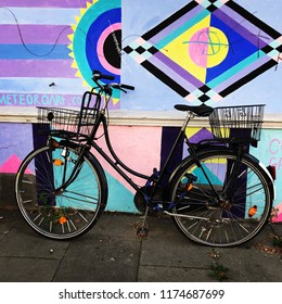 Hamburg, Germany-2 September, 2018: bicycle in the city, street art, urban style, graffiti wall - Powered by Shutterstock