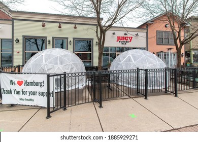 Hamburg, USA - January 2 2021: Juicy Burger Bar With Igloo Shelters For Outdoor Dining And Heat Towers 