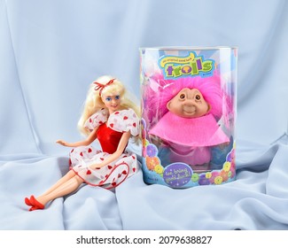 Hamburg, USA - November 23 2021: A Collection of Mattel Barbie Doll and Troll by Dam 