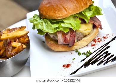 Hamburger and fries on a plate