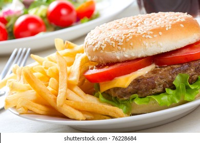 Hamburger With Fries And Salad