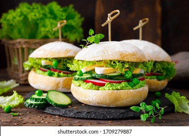 Hamburger With Homemade Ciabatta Bun Bread, Boiled Egg, Radish, Cucumber, Lettuce Salad And Puree Of Fresh Green Peas