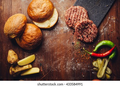 Hamburger Ingredients In A Table With Space For A Logo