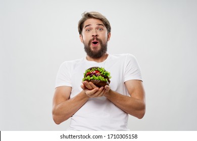 Hamburger Man In A White T-shirt Emotions Fear And Surprise