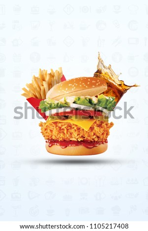 Hamburger on a asesame bun with iced soda drink and crisp golden potato French fries on a white background