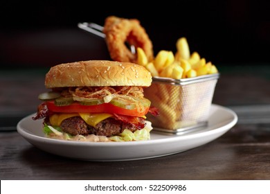 Hamburger On A Plate With Potatoes