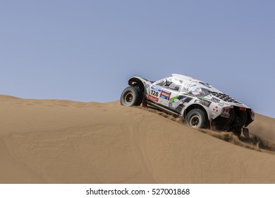 HAMI, CHINA-JULY 18, 2016: Sports Car Gets Over The Difficult Part Of The Route During The Silk Way Rally Moscow-Beijing Dakar Series In The Sand Desert