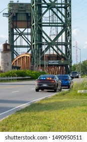 Hamilton, Canada - Aug 28, 2019: Undercover Unmarked Police OPP Vehicle With Flashing Red And Blue Lights Has Pulled Over A Car On The Side Of The  Road. Dangerous, Careless Driving, Speeding, DUI.