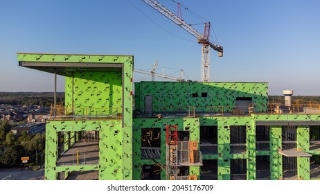 Hamilton, Ontario  Canada - August 4 2021: Aerial View Of A Neighbourhood Development Under Construction With A Big Crane In Waterdown, Ontario Near Dundas Street East (Highway 5) At Riverwalk Drive