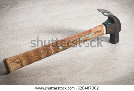 Hammer isolated on granite texture