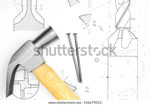 Hammer and nails on the
drawing.