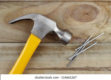 Hammer And Nails On Wood