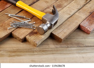 Hammer And Nails On Wood