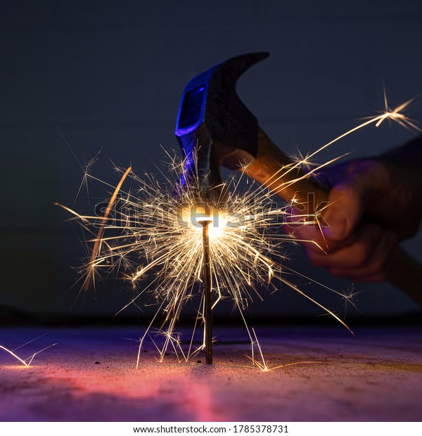 Hammer Strikes Nail Bright Sparks Fire Stock Photo (Edit Now) 1785378731