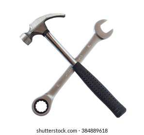 Hammer and wrench isolated on white background.