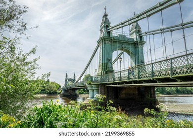 Hammersmith bridge over Thames river in London, UK