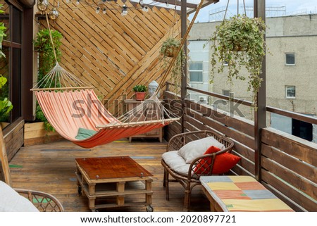 Image, Stock Photo Old wooden chair, hammock and green artificial grass on the roof terrace of a hotel in Taksim district in summer sunshine on Istiklal Caddesi in Istanbul on the Bosphorus in Turkey