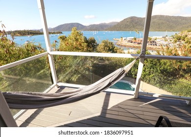 Hammock Set Up On Balcony Of Apartment Block In The Whitsundays, Queensland, Australia