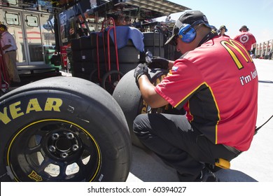 HAMPTON, GA - SEP 04:  The McDonalds Crew Take Measurements On Tires During A Practice Session For The Emory Healthcare 500 Race At The Atlanta Motor Speedway In Hampton, GA On Sep 04, 2010.