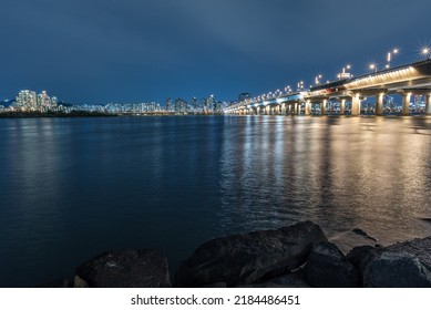 Han river and Seoul cityscape night view in South Korea on 15 April 2022 - Powered by Shutterstock