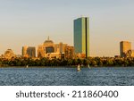 Hancock Building and urban skyscrapers over Charles River