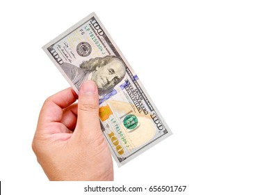Hand with $100 banknotes stack isolated on white background with clipping path