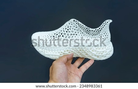 hand with 3d printed shoe figure close-up Foto stock © 
