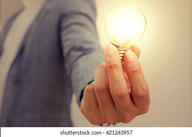 Hand Action Icon Symbol On Business Suit Means Business Actions Or Activities Use For Empower, Encourage, Work, Win, Fight, Victory Business, Or Present Work, Business, Products With Light Bulb