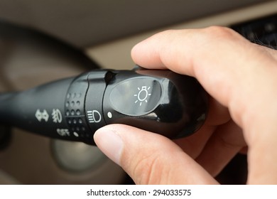 Hand adjusting car headlight control switch