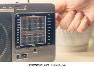 Hand Adjusting The Settings Of Vintage Old Radio, Search For Radio Station Wave