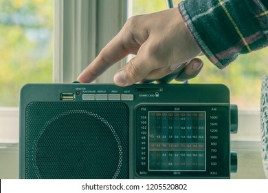 Hand Adjusting The Settings Of Vintage Old Radio, Search For Radio Station Wave