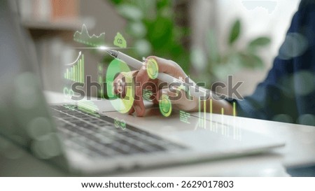 Hand analyzing environmental data with net zero dashboard, carbon footprint metrics, and green analytics. Concept of ESG, sustainability, eco technology, and digital climate solutions.