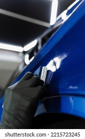 Hand Applying Of Nano Ceramic Protective Coat To Protect Car From Scratches. Process Of Apply Ceramic Layer On Body Car Using Sponge Close-up In Detailing Auto Service