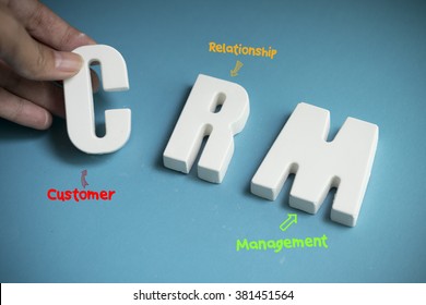 Hand Arrange White Letters As CRM (customer Relationship Management)