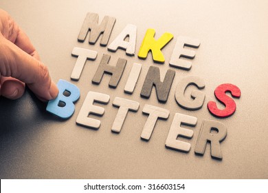 Hand Arrange Wood Letters As Make Things Better Phrase For Motivation Concept