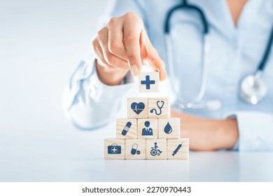 Hand Arranging Wood block With Health medical icon health insurance concept.