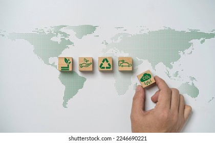 Hand array CO2 reducing ,Recycle ,Green factory icon on world map for decrease CO2 , carbon footprint and carbon credit to limit global warming from climate change, Bio Circular Green Economy concept.