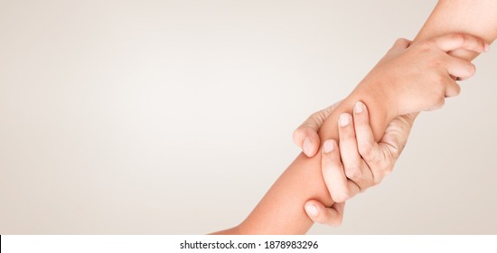 Hand Of Asian Man And Kid Holding Each Other. Helping Hand Concept With Copy Space.