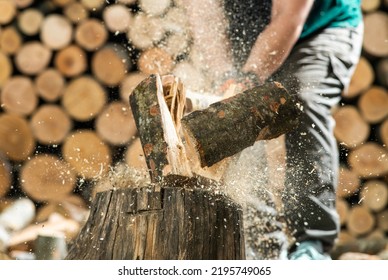 Hand and axe in firewood, chopping wood for fire heat  - Powered by Shutterstock