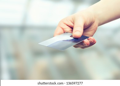 A Hand With Bank Credit Plastic Card