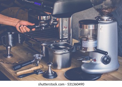 Hand Of Barista Put A Portafilter To Espresso Machine For Brewing Coffee