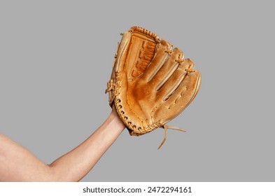 Hand of baseball player with glove isolated on gray. Baseball, active leisure, sports, championship - Powered by Shutterstock