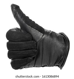 hand in a black leather glove with thumb up. isolated on white background - Shutterstock ID 1613086894