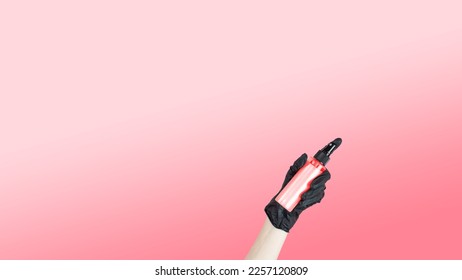 A hand and black rubber glove holding hair care product spray pink gradient background  Banner