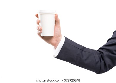 Hand In A Black Suit Holding A Paper Cup. White Background. Concept Of Coffee Break.