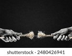 Hand in Black and White Pulling Frayed Rope to Opposite Sides at Breaking Point, Paper Textured Black Background with Copy Space