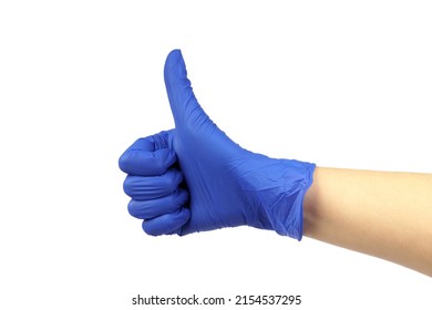 Hand In Blue Medical Glove Showing Thumbs Up On White Background