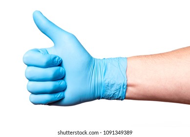 Hand In Blue Medical Glove Shows Thumbs Up