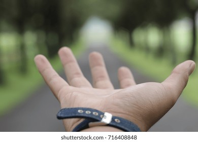 A hand with blur backround