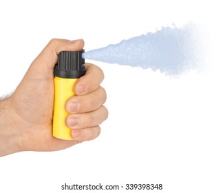 Hand with bottle of pepper spray isolated on white background